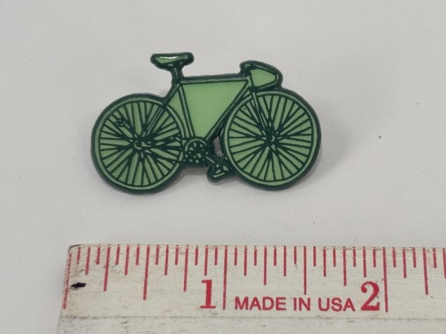 track bike enamel pin